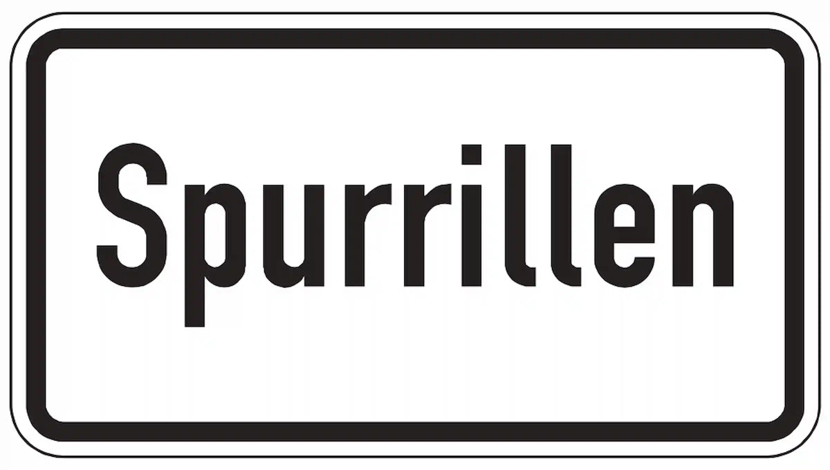 Warnung vor Spurrillen auf der Fahrbahn